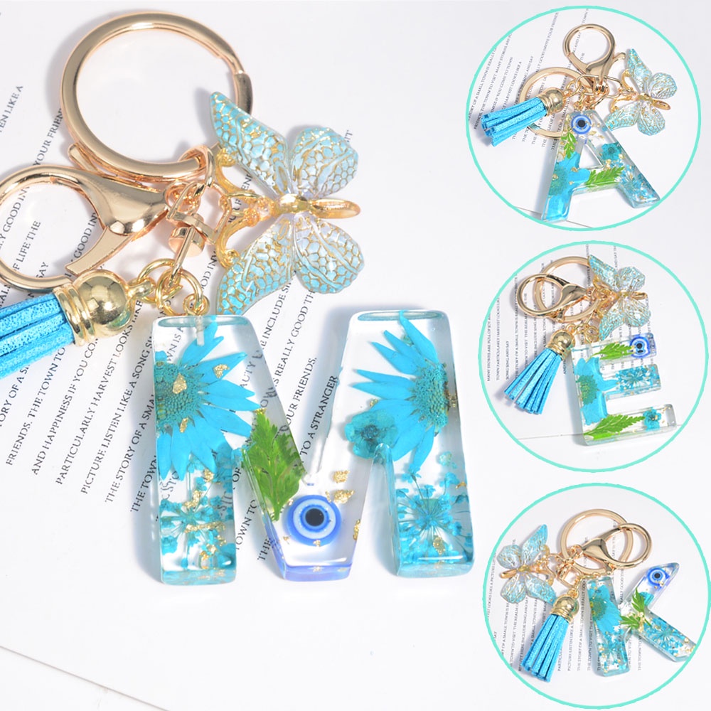 Móc Chìa Khóa Hình 26 Chữ Cái Và Bướm Phối Hoa Khô Màu Xanh Dương Phối Tua Rua Thời Trang Cho Nữ Giá Đỡ