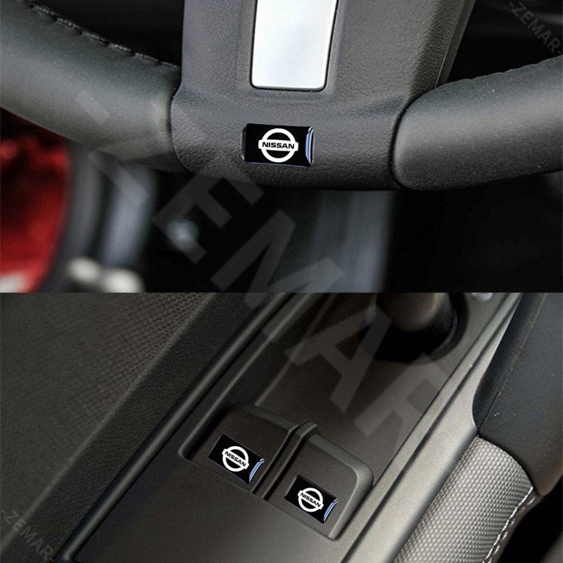 Bộ 10 Huy Hiệu 3D Trang Trí Công Tắc Cửa Sổ Xe Hơi Nissan March Juke Skyline Terra Livina Note Xtrail Magnite Kicks Navara Serena Leaf