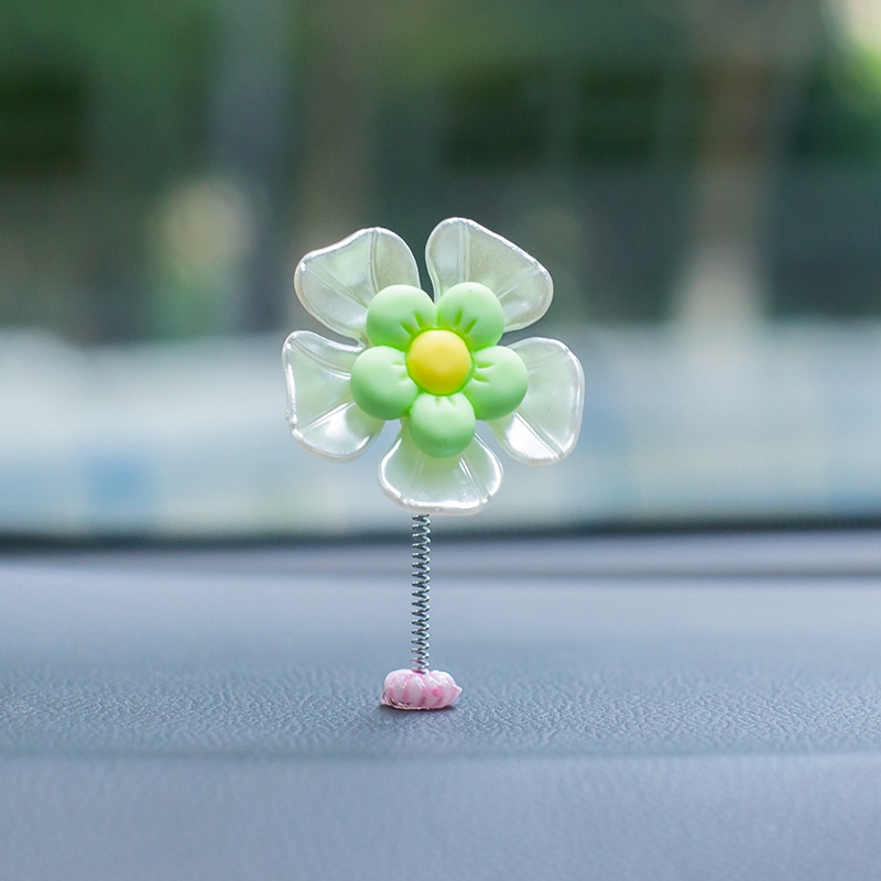 Xe lắc đầu trang trí cánh hoa, màn hình bảng điều khiển trung tâm, phim hoạt hình trang trí nội thất ô tô