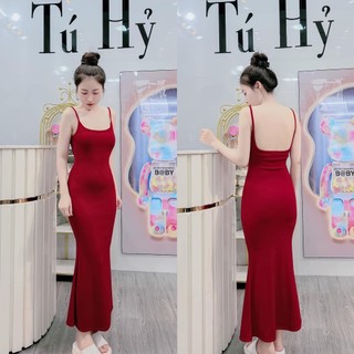 Đầm hở lưng có must , chất thun gân mịn co giãn tốt . Có sẵn