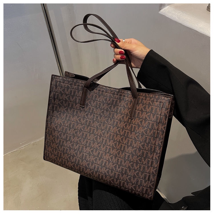 The new trendy vintage one-shoulder shoulder strap bag girls Korean version of the high-capacity high-end handbag tote bag