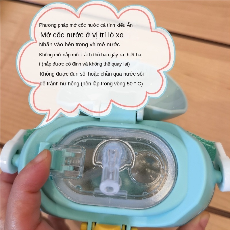 Bình Nước Hình Bánh Donut Dễ Thương Có Dây Đeo Cho Bé MY0174