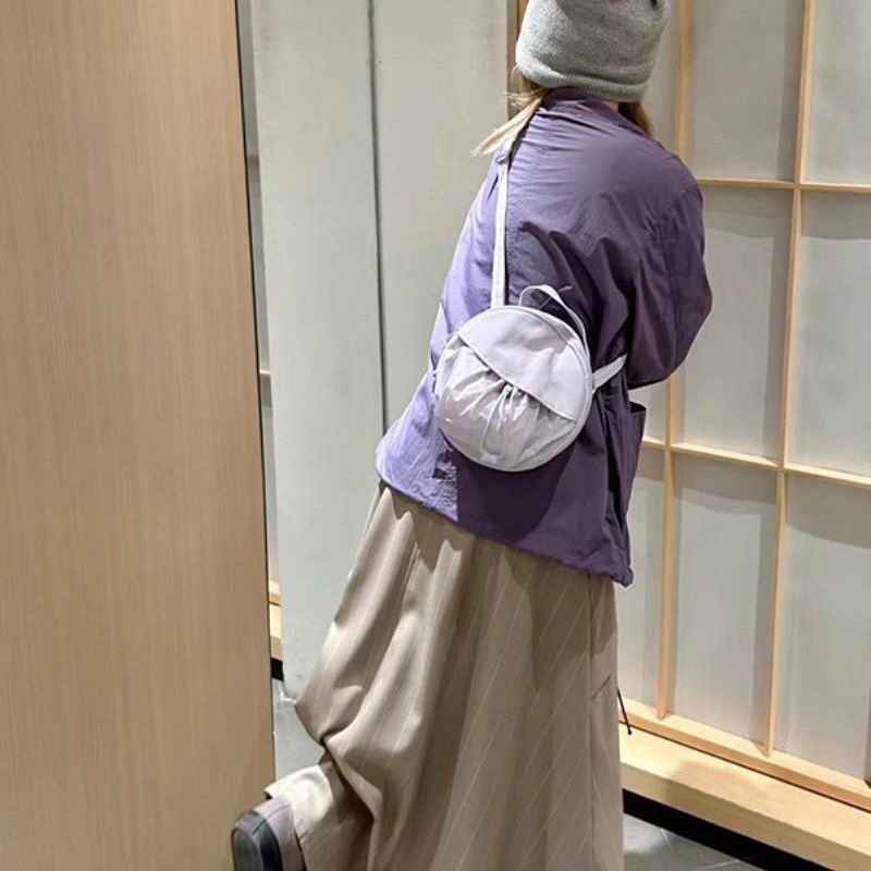 Túi Đeo Chéo Dây Rút Dáng Tròn Nhỏ Vải Nilon Màu Tím Thời Trang Cao Cấp