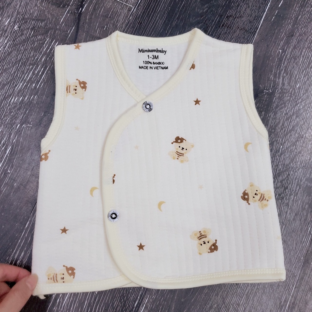 Áo gile sơ sinh vải nỉ xốp trần bông dày dặn mềm mại cúc cài lệch bé trai bé gái 0-9 tháng