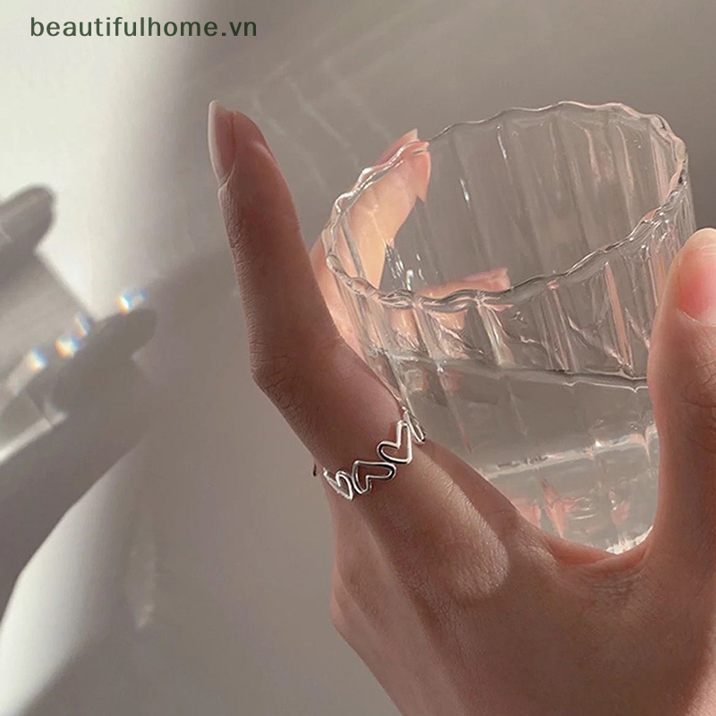 1 Bộ Nhẫn Dạng Hở Màu Bạc Hình Trái Tim Cá Tính Thời Trang Có Thể Điều Chỉnh