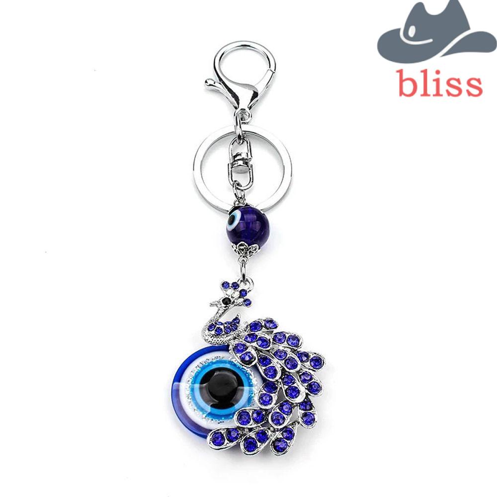 Móc Khóa Hình Đôi Mắt Quỷ Phối Tua Rua Màu Xanh Dương Dùng Làm Quà Tặng