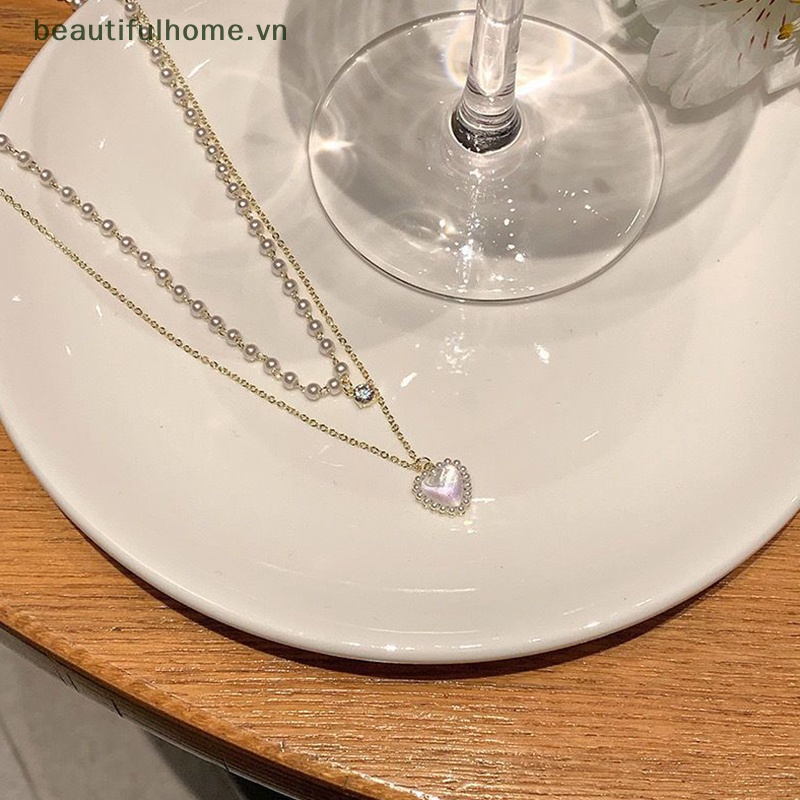 Vòng cổ Mặt Hình Trái Tim Đính Ngọc Trai Lấp Lánh Thời Trang Cho Nữ