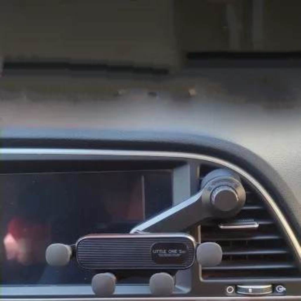 Giá Đỡ Điện Thoại Gắn Khe Điều Hòa Xe Hơi Tiện Dụng