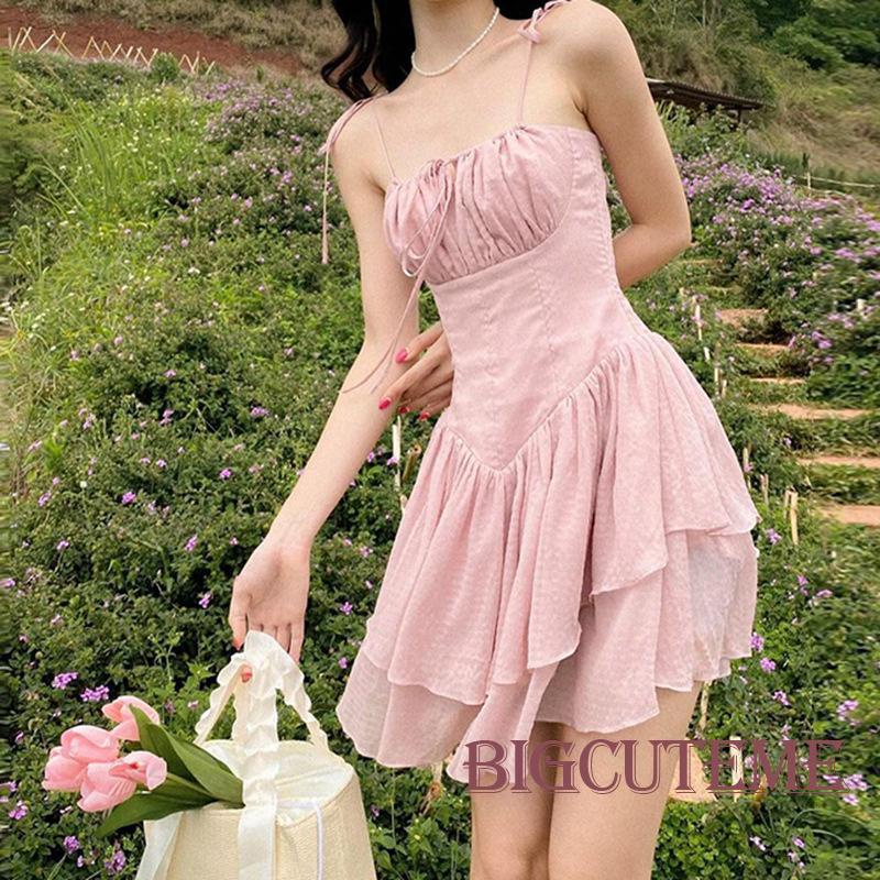 [] - Đầm Mini Dáng Chữ A Không Tay Có Dây Cột Vai Viền Bèo Nhún Màu Hồng Dễ Thương Cho Nữ