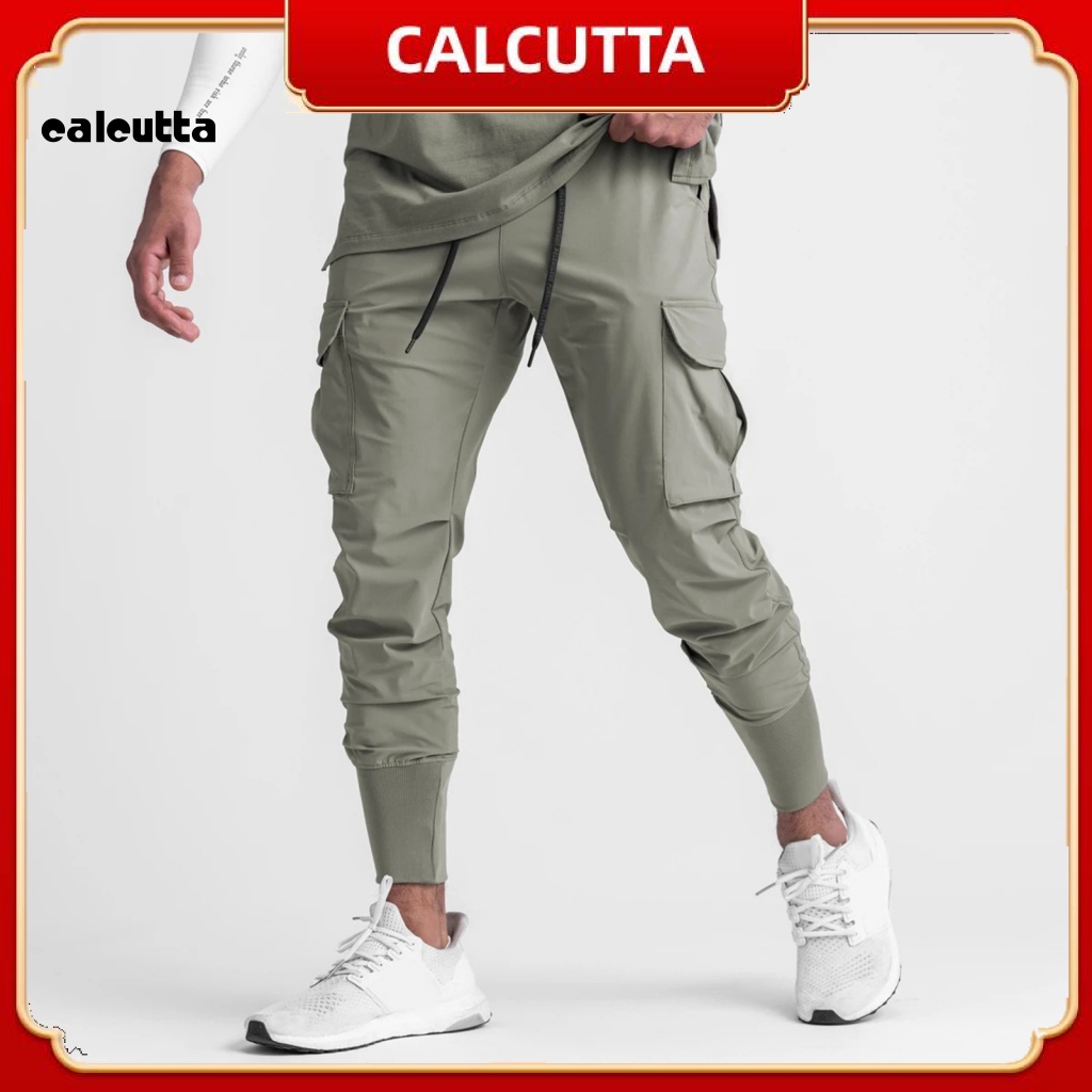 Quần Thể Thao Dài Dây Rút Co Giãn Khô Nhanh Nhiều Túi Màu Sắc Thời Trang Mùa Hè Cho Nam