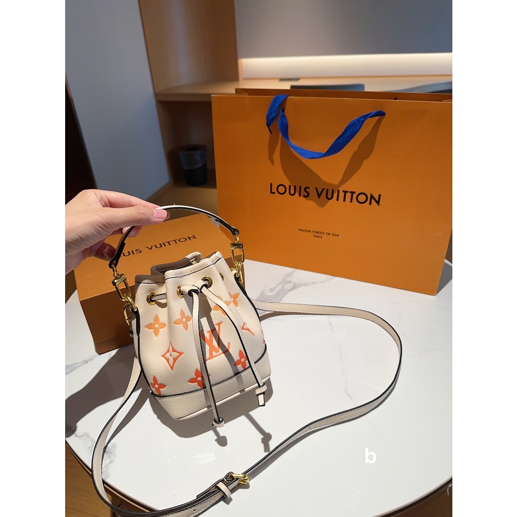 L nano noe túi messenger có dây rút mini dành cho nữ