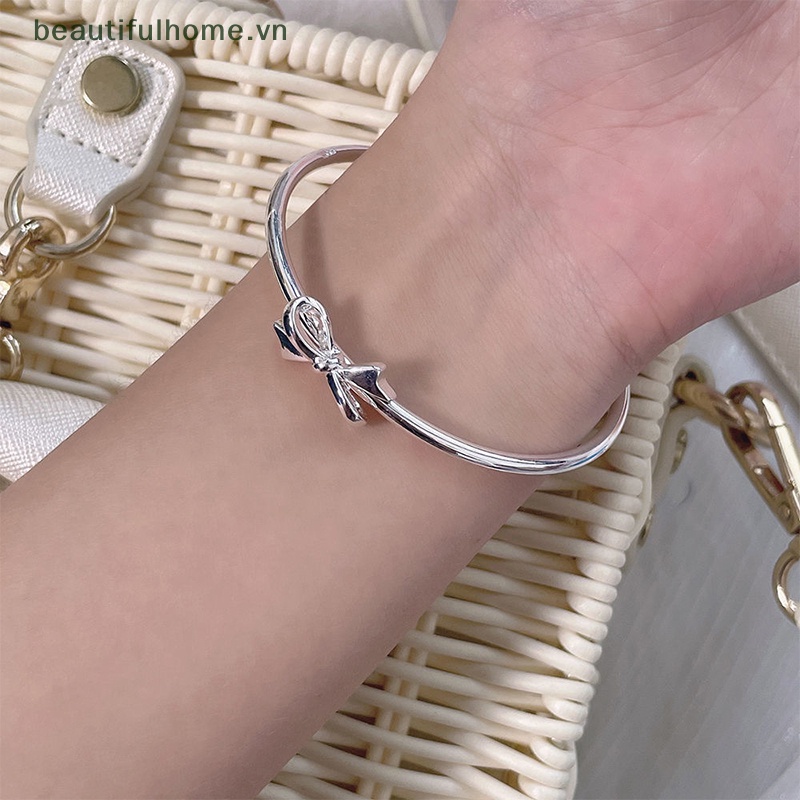 Vòng Tay Hở Màu Bạc Đính Nơ Có Thể Điều Chỉnh Cho Nữ