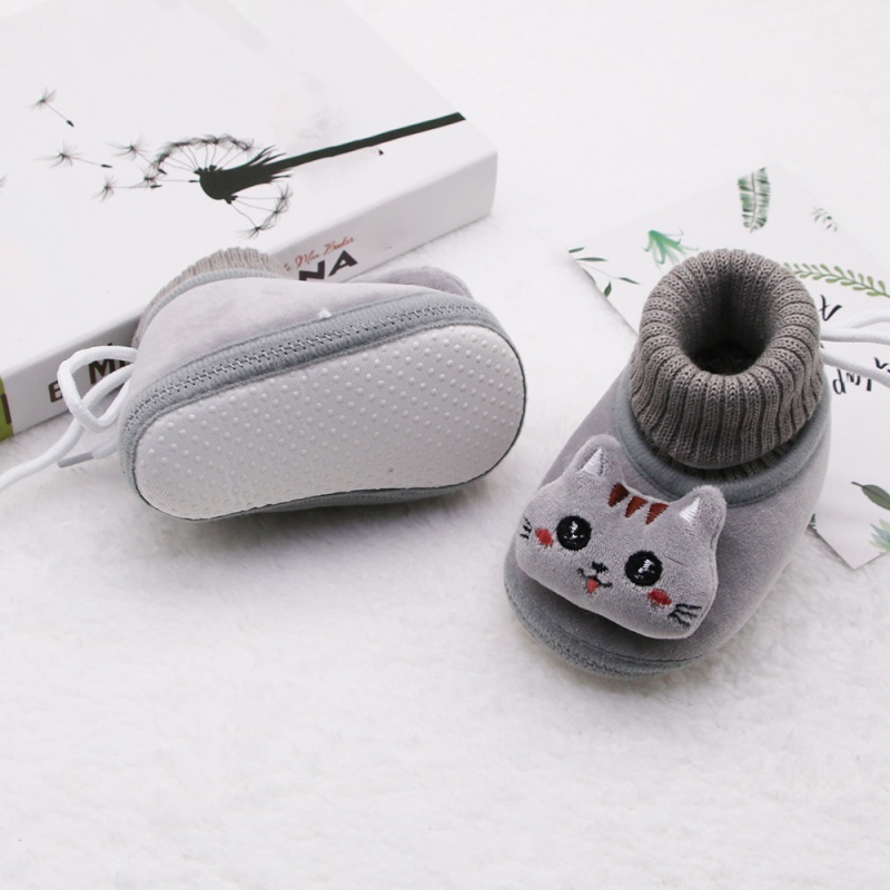 Bé trai bé gái giày bông trẻ sơ sinh trẻ sơ sinh mèo con cộng với nhung snow boots sơ sinh dễ thương đế mềm giày đi bộ mềm