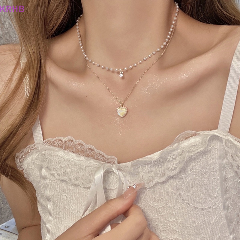 Vòng cổ Mặt Hình Trái Tim Đính Ngọc Trai Thời Trang Dành Cho Nữ Mới