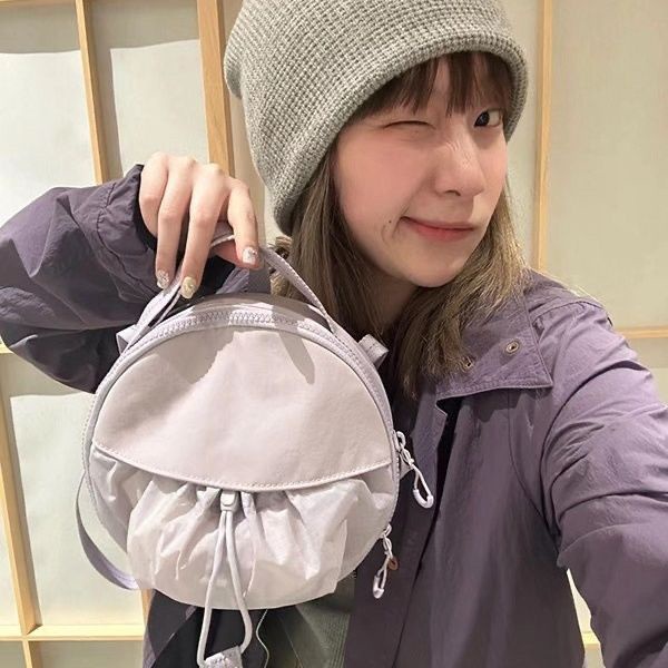 Túi Đeo Chéo Dây Rút Dáng Tròn Nhỏ Vải Nilon Màu Tím Thời Trang Cao Cấp