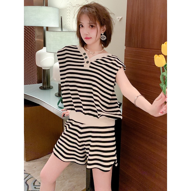Bộ Áo Sweater Dệt Kim Cổ Chữ V Thắt Nơ Sau Lưng + Quần Short Xẻ Tà Thời Trang Mùa Hè 2023 Cho Nữ