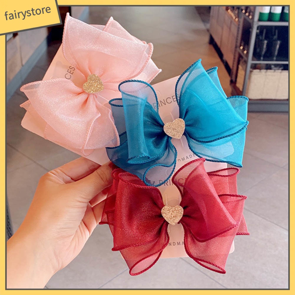 Kẹp Tóc Nơ Hình Trái Tim Lấp Lánh Cho Bé Gái