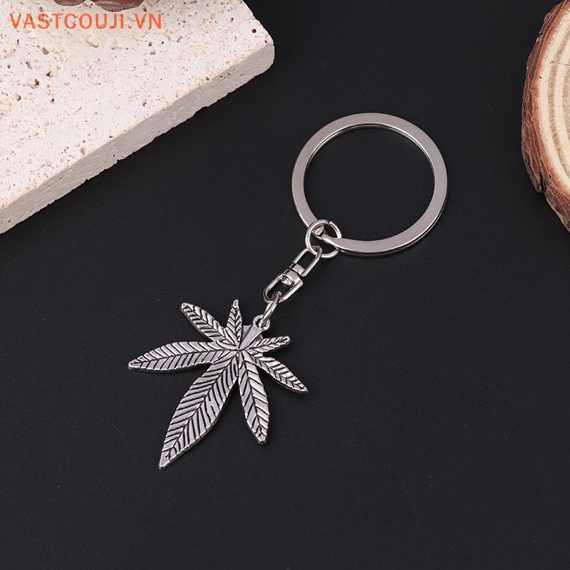 Móc Khóa Kim Loại Hình Lá Phong Màu Bạc Thời Trang