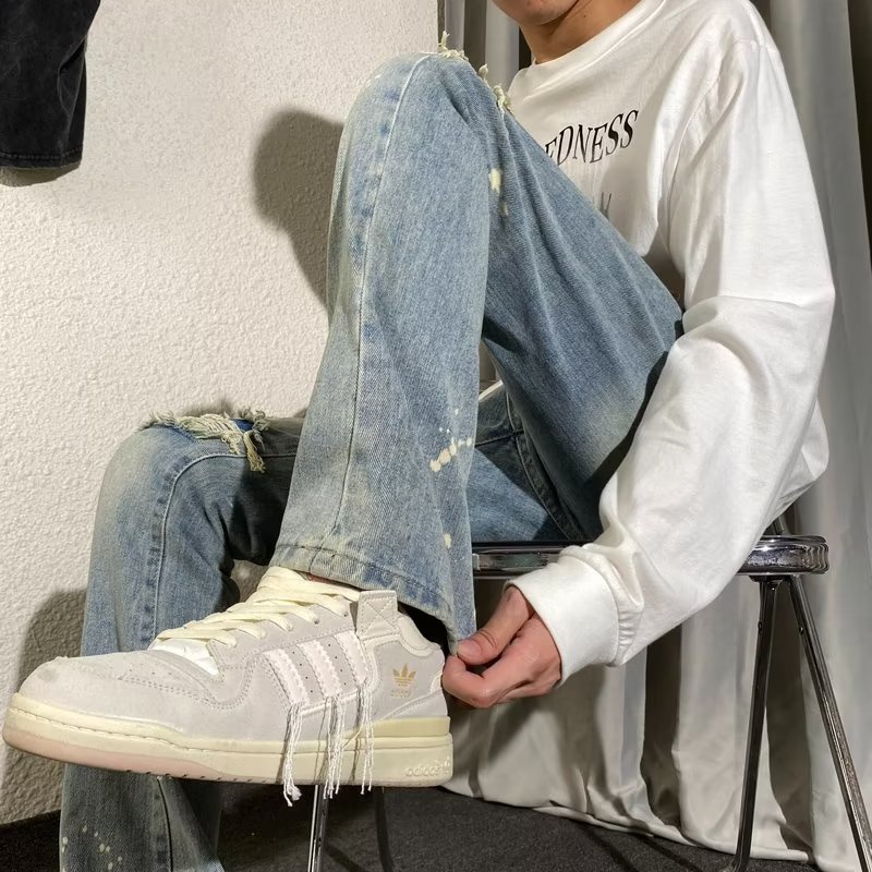 Quần Jean Dài Dáng Ôm Rách Gối Phong Cách Đường Phố Mỹ Cá Tính Cho Nam Và Nữ