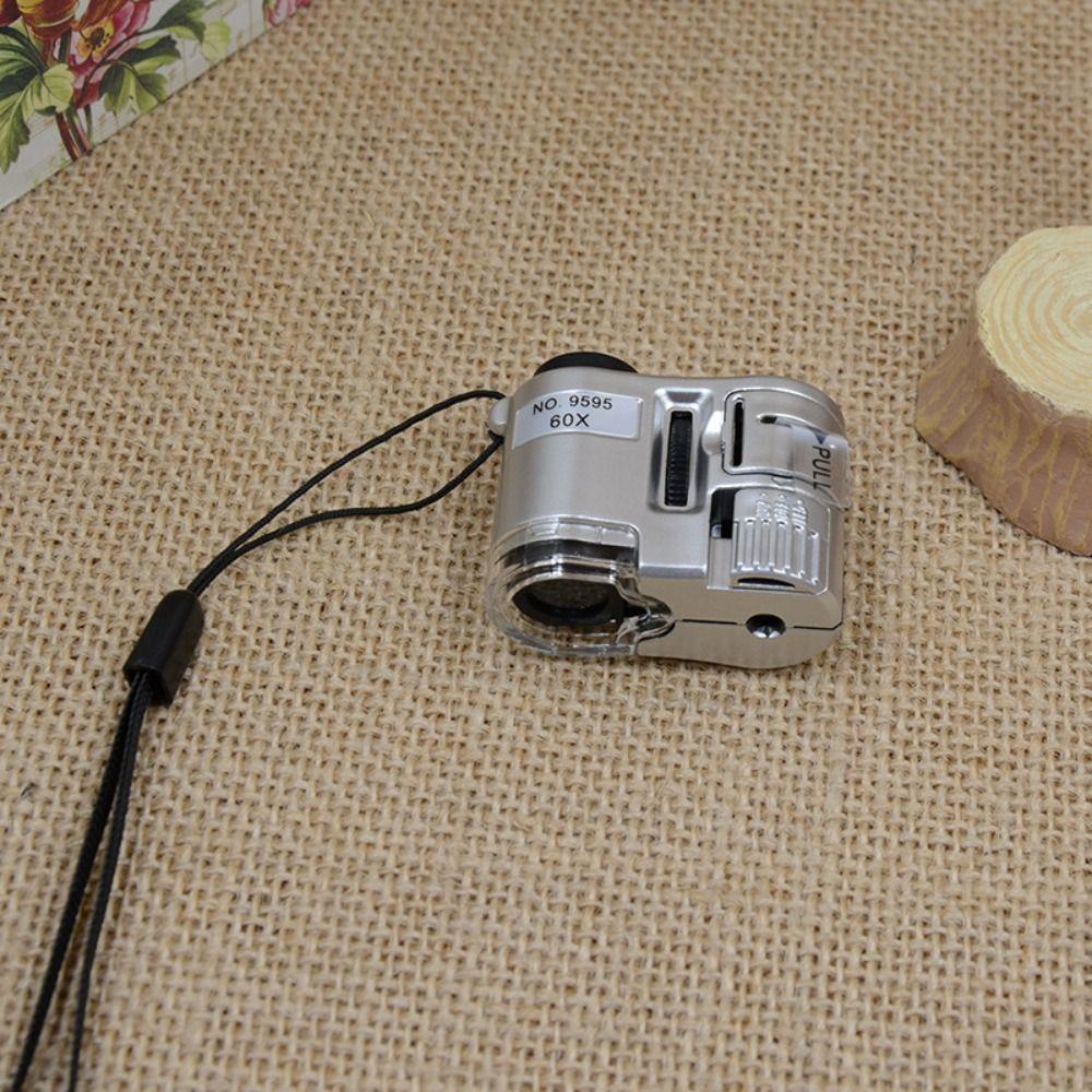 Moc Kính Lúp Phóng Đại 60 Lần Cầm Tay mini Có Đèn led Soi Tia uv