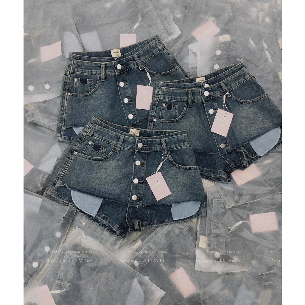 Quần váy je.an nút túi lộ