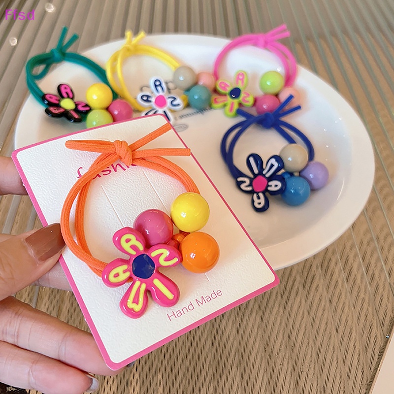 Dây Cột Tóc Co Giãn Hình Bông Hoa Màu Sắc Đáng Yêu Thời Trang Cho Bé Gái