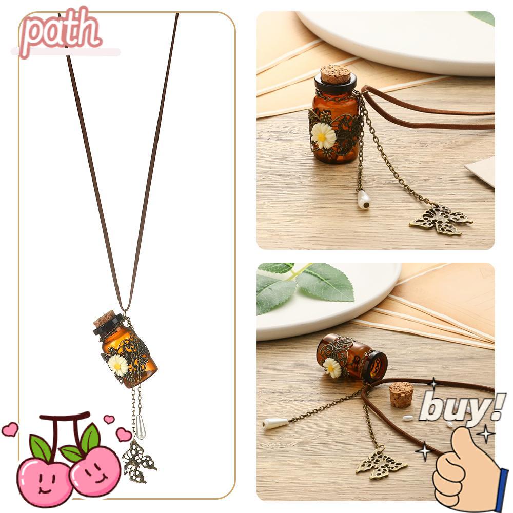 Vòng cổ Da Dài Phối Mặt Hình Lọ Điều Ước Và Bướm