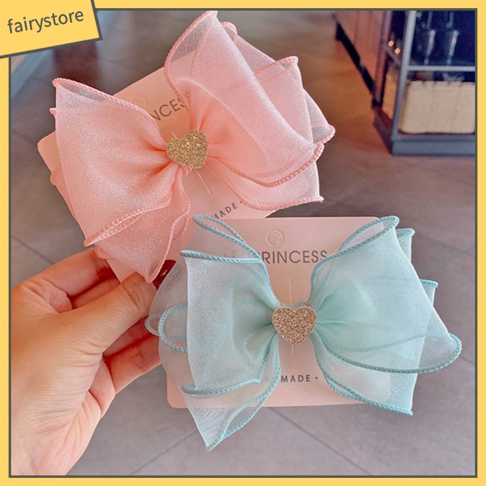 Kẹp Tóc Nơ Hình Trái Tim Lấp Lánh Cho Bé Gái