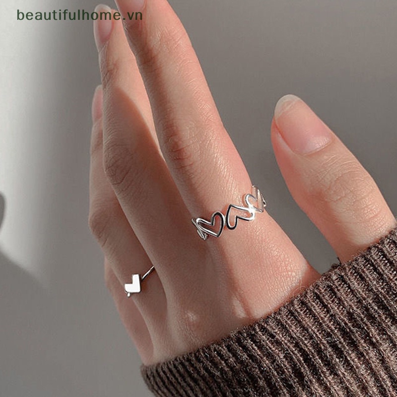 1 Bộ Nhẫn Dạng Hở Màu Bạc Hình Trái Tim Cá Tính Thời Trang Có Thể Điều Chỉnh