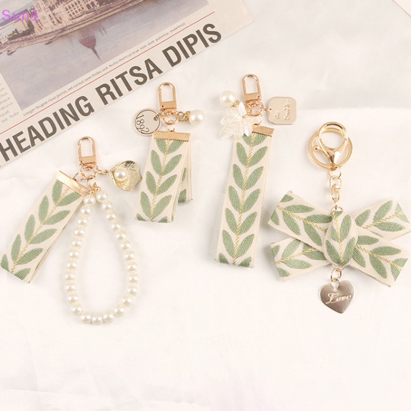 Sun1> mô hình lá thanh lịch vòng tay móc khóa mặt dây chuyền vỏ ngọc trai dễ thương có dây đeo và dây đeo cho nữ chìa khóa điện thoại ví trang trí tốt