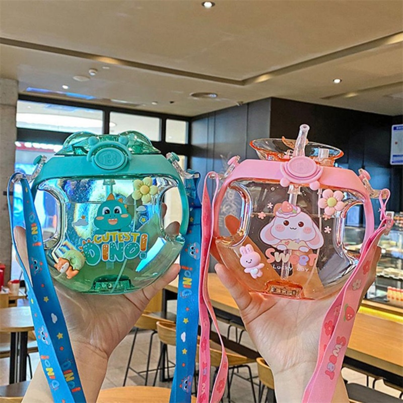 Bình Nước Trong Suốt Hình Bánh Donut Kèm Ống Hút Và Dây Đeo Dễ Thương Cho Học Sinh
