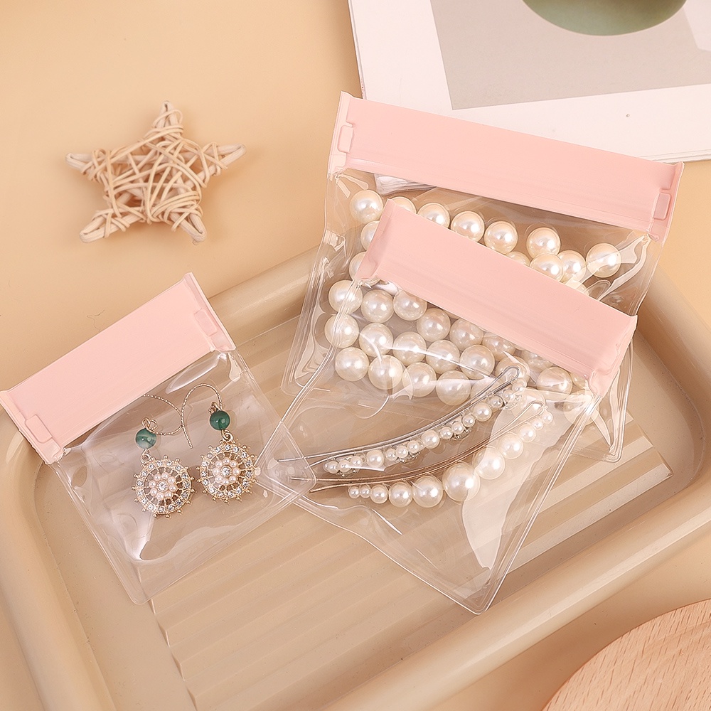 Túi Đựng Trang Sức Mini Chống Bụi Chống Nước Chống Oxy Hóa Màu Hồng Trong Suốt Có Thể Tái Sử Dụng