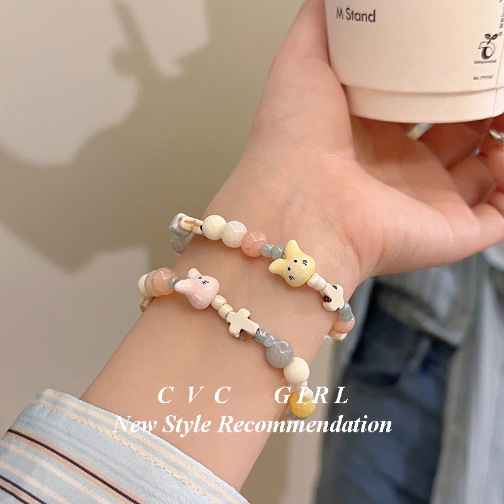 Vòng tay đính cườm gốm dễ thương màu kem nữ mùa hè phong cách mới dây thun sinh viên bạn gái đồ trang sức hoạt hình