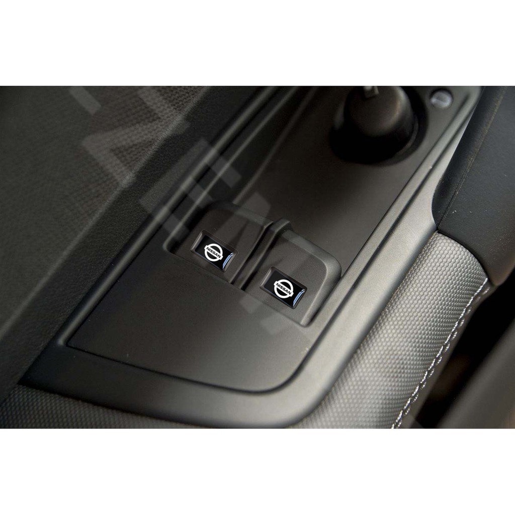 Bộ 10 Huy Hiệu 3D Trang Trí Công Tắc Cửa Sổ Xe Hơi Nissan March Juke Skyline Terra Livina Note Xtrail Magnite Kicks Navara Serena Leaf
