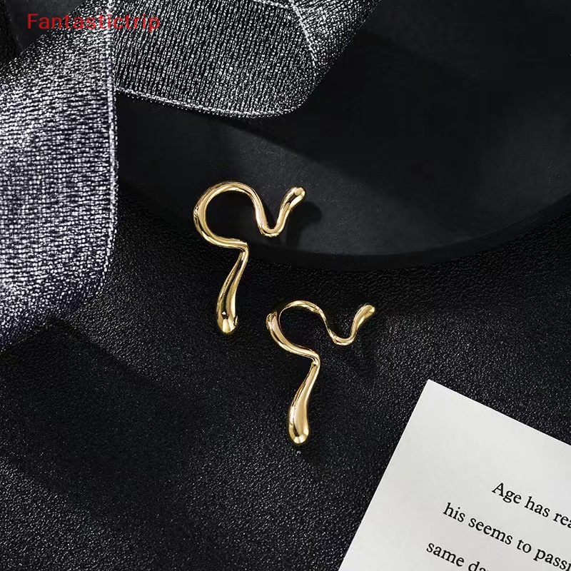 Bông Tai Dạng Kẹp Bằng Kim Loại Thiết Kế Bất Đối Xứng Thời Trang Cho Nam Và Nữ