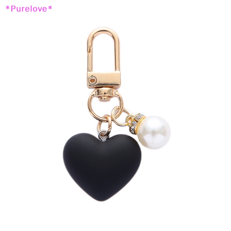 Purelove &gt; Móc Khóa Hình Trái Tim Mặt Nhám Màu Trắng Đen Đính Ngọc Trai Thời Thượng Kèm Túi Đựng Tai Nghe Cho Cặp Đôi /