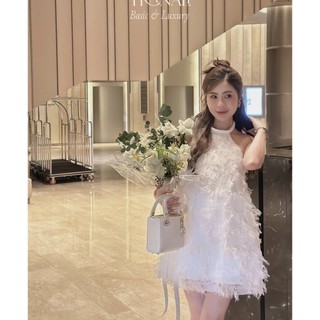 Đầm lông vũ cổ yếm hở lưng thắt nơ