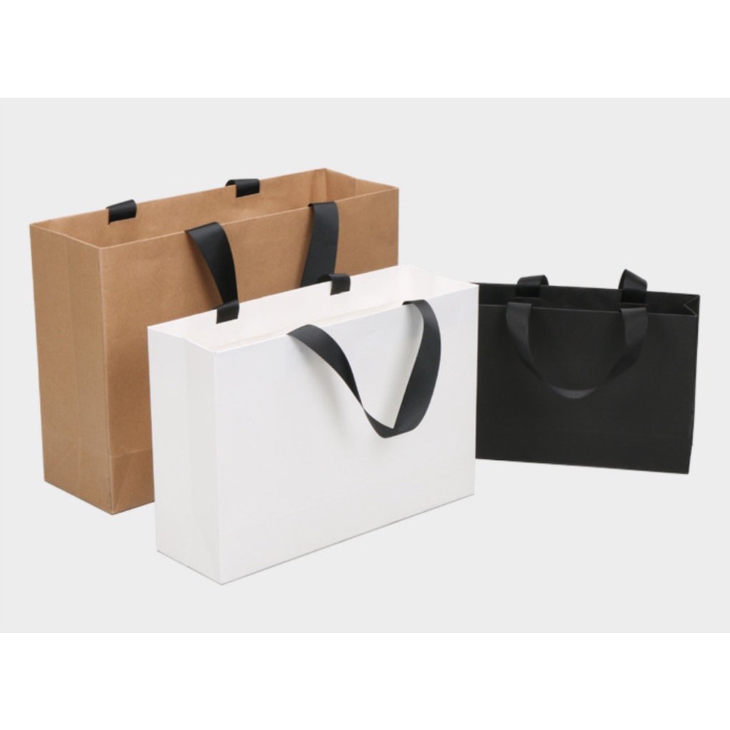 Túi giấy quai vải dán ẩn