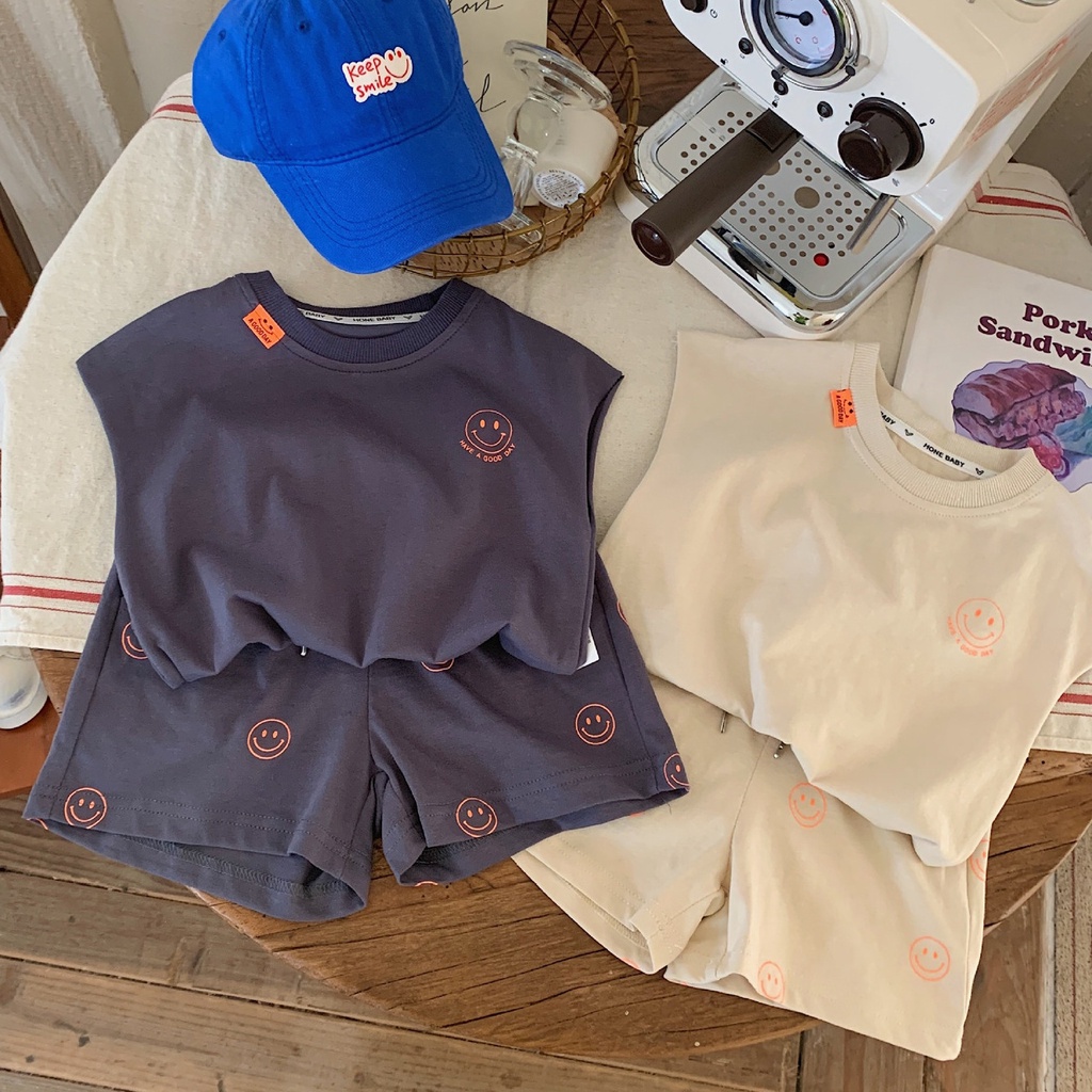 Bộ Áo Thun Không Tay + Quần Short Cotton Dáng Rộng In Hình Mặt Cười Thời Trang Mùa Hè 2023 Mới Cho Bé Trai Gái
