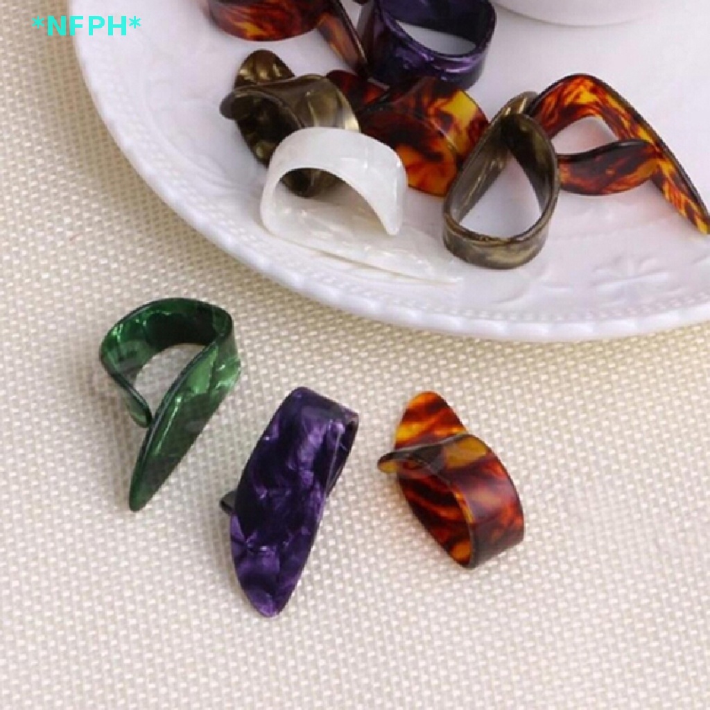 Bộ 4 Miếng Gảy Đàn guitar Điện NFPH Mới