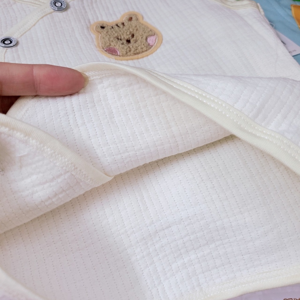 Unchi 2023 áo gile mùa đông cúc cài lệch vải xô muslin mềm mại thoáng khí giữ âm cho bé trai bé gái 0-18 tháng