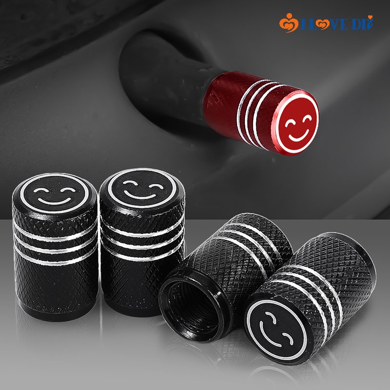 Bộ 4 Nắp Van Bánh Xe Hơi / Xe Máy Hình Mặt Cười Bằng Hợp Kim Nhôm Chống Rò Rỉ