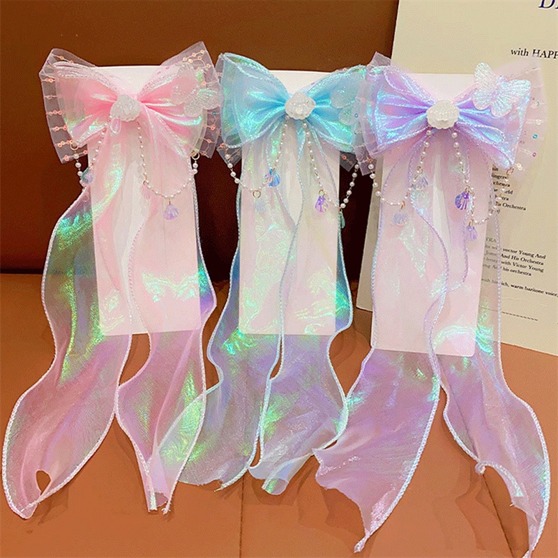 Kẹp Tóc Ruy Băng Đính Nơ Tua Rua Xinh Xắn Cho Nữ