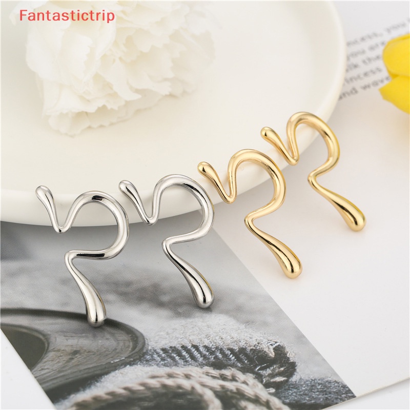 Bông Tai Dạng Kẹp Bằng Kim Loại Thiết Kế Bất Đối Xứng Thời Trang Cho Nam Và Nữ