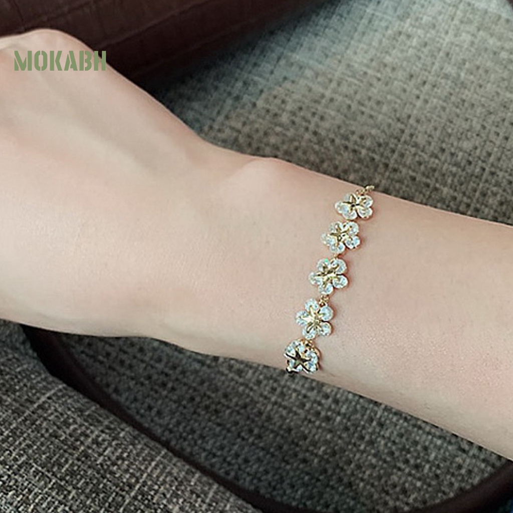 Vòng Đeo Tay Hình Hoa Năm Cánh Đính Đá Zircon Lâu Trôi Tinh Tế Cho Nữ