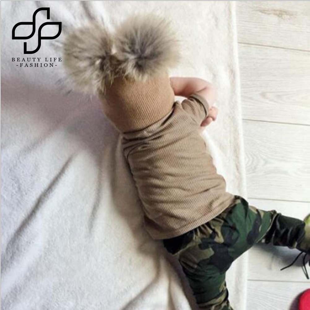 Nón Len Ấm Áp Màu Trơn Đính Hai Quả Bông Thời Trang Thu Đông Cho Bé