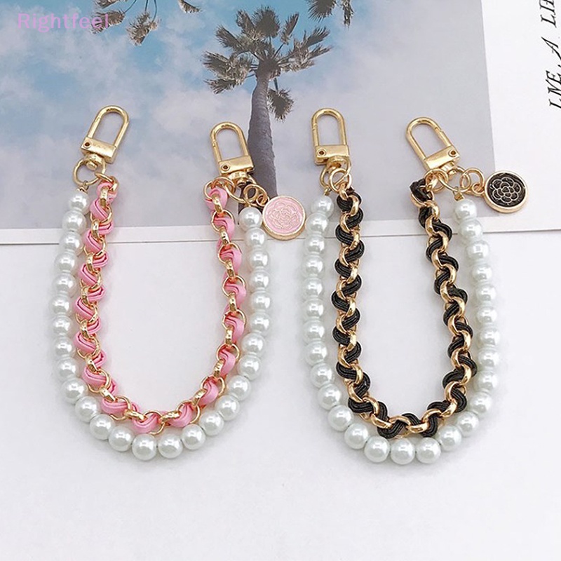 Dây Đeo Tay Bằng Da Đính Ngọc Trai Chống Thất Lạc Cho Điện Thoại Mới