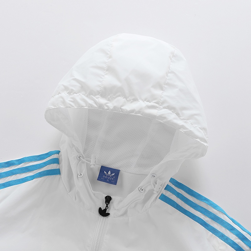 Thêu logo adidas áo gió có mũ trùm đầu ban đầu áo gió nữ áo gió thể thao áo gió ngoài trời