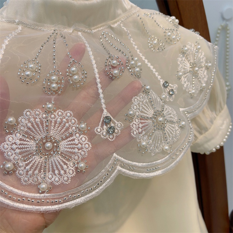 Cô gái retro heavy industry dress 2023 mùa hè phong cách mới trẻ em phong cách phương tây đám mây vai sườn xám bé ngắn tay-váy công chúa