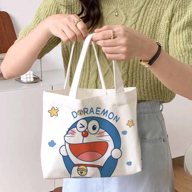 Túi xách Doraemon ra túi vải cô gái hoạt hình robot dễ thương mèo ins bento túi xách làm việc